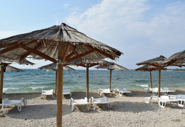 https://unsplash.com/photos/a-bunch-of-umbrellas-that-are-on-a-beach-bIKUnm2oNZk