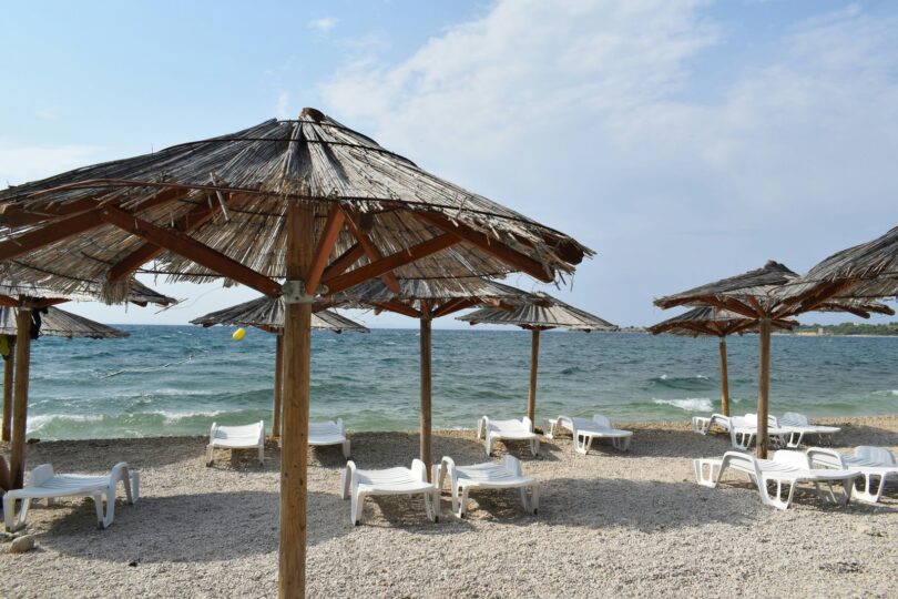 https://unsplash.com/photos/a-bunch-of-umbrellas-that-are-on-a-beach-bIKUnm2oNZk